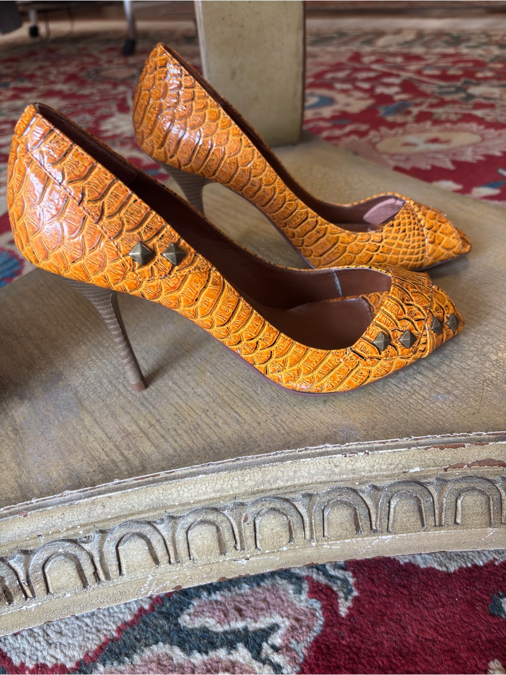Women’s Python printed Peep Toe Stiletto Heels
Size 10 with metal pyramid studs